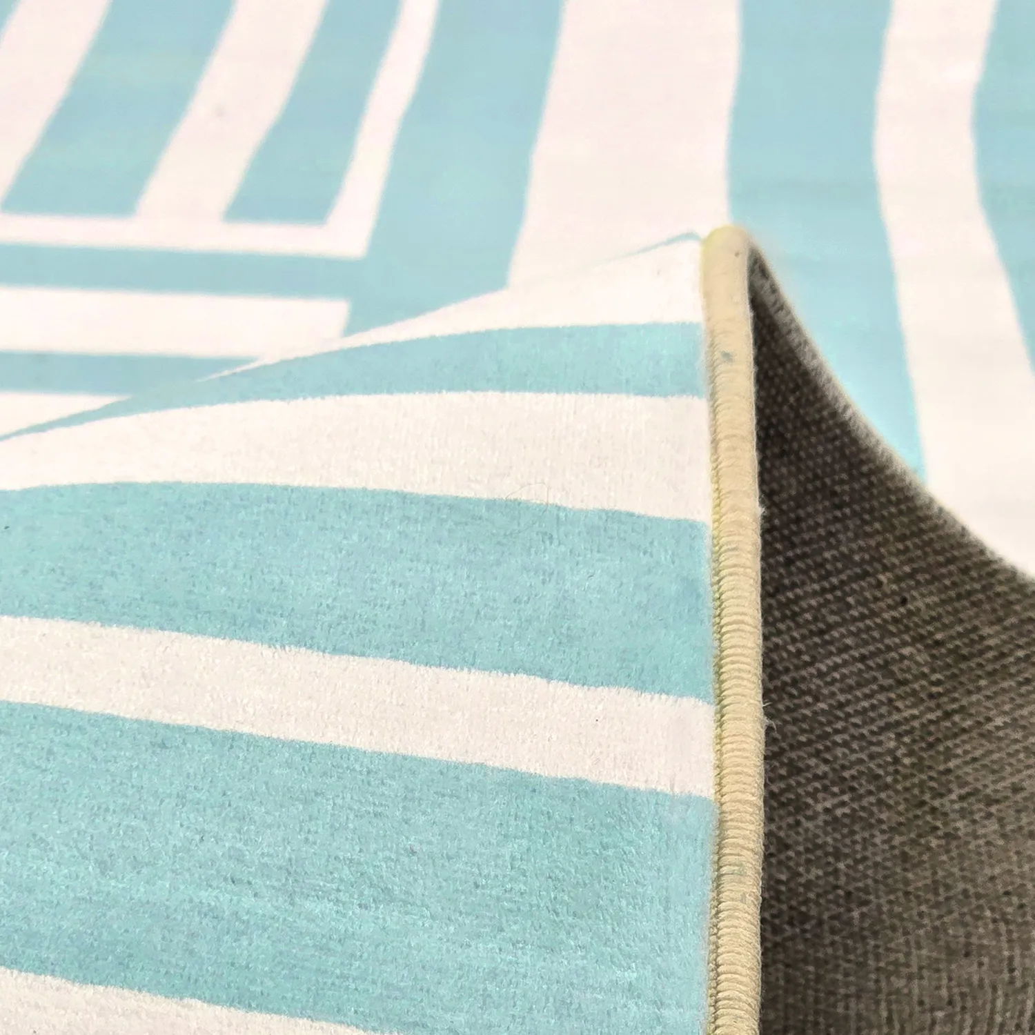 Tapis Wilton - Joma (turquoise/blanc)